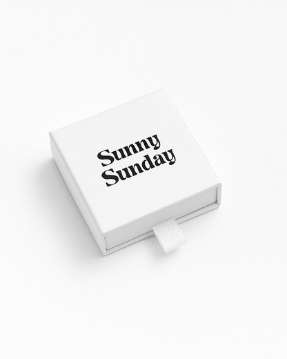 White box with 'Sunny Sunday' text on a white background
