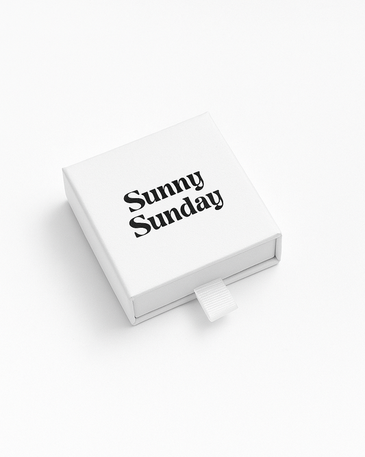 White box with 'Sunny Sunday' text on a white background